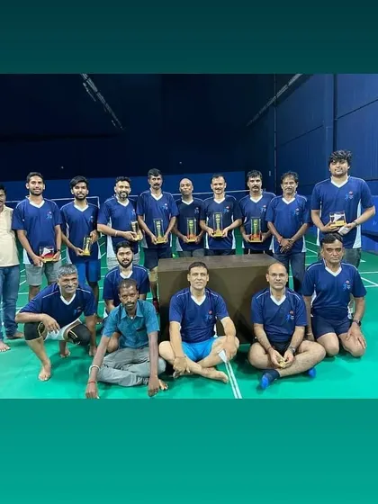 Team Avengers, one of our adult teams, posing with their trophies after a successful tournament.