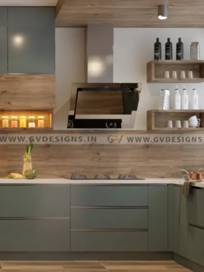 This kitchen combines rustic wooden textures with muted green cabinets. The design includes a tall pantry unit, open wooden shelves for display, and G-profile handles for a sleek, modern touch.