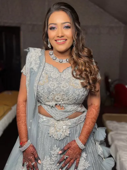 Another shot of the bride, her smile showing her happiness with the look.