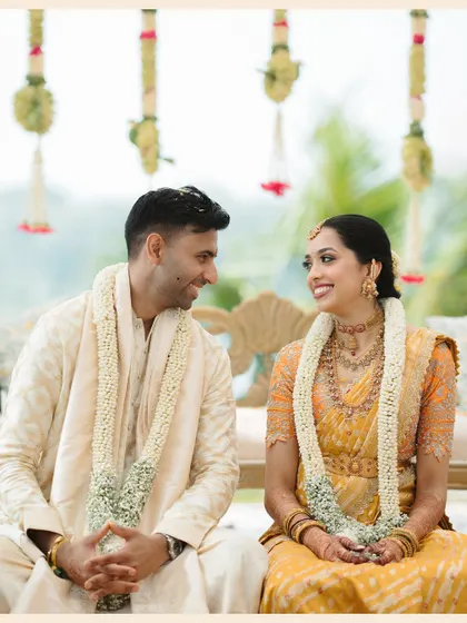 A beautiful, candid moment between the couple during their ceremony, their expressions full of love and happiness.