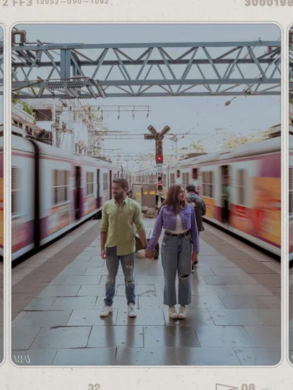 A creative shot using motion blur from passing trains to frame the couple, symbolizing their journey together.