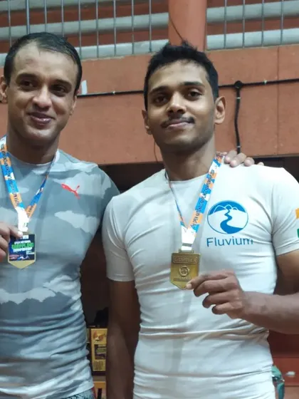 With my friend and fellow gold medalist. We push each other in training and celebrate our victories together.