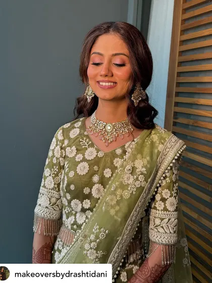 A close-up of the eye makeup, showing the soft, blended eyeshadow. The goal was to define her eyes while keeping the overall look natural and elegant for a daytime ceremony.