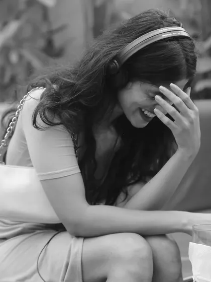 A candid, black and white photo of me reacting to hearing my vocals on a newly released track by DJ Sahil Madaan. I am also available for studio session work as a vocalist.