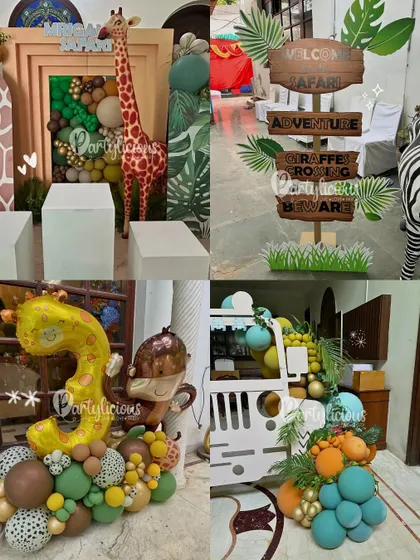 A closer look at the details from a wild jungle safari adventure, including custom signage, animal props, and themed balloon bouquets.