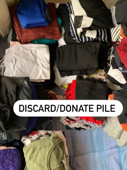 The "Discard/Donate Pile." Letting go of what no longer serves you makes room for a wardrobe that you truly love.