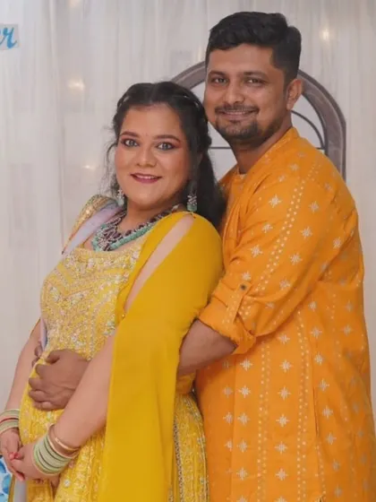 Another shot of this glowing mom-to-be and her partner. The makeup was designed to be flawless and effortless, perfect for capturing these precious memories.