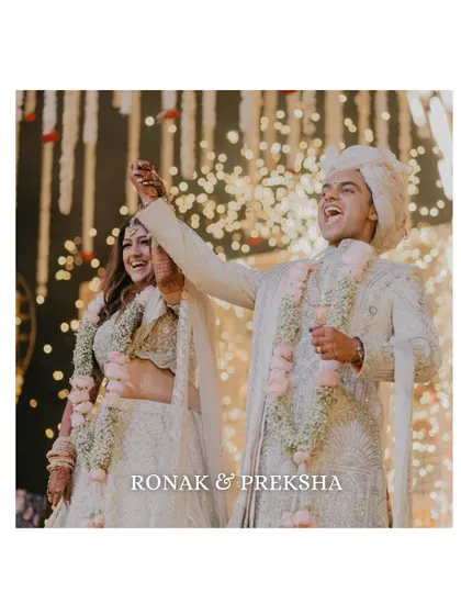 Pure, uninhibited joy. This candid shot of the couple laughing during their wedding celebration is a perfect example of the real, raw, and beautiful moments we aim to capture throughout the day.