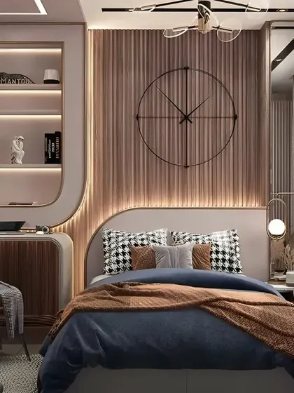 A cozy bedroom design with a built-in desk and shelving unit, perfect for a teen or a small guest room. The large clock and wood panelling add a touch of modern rustic charm.