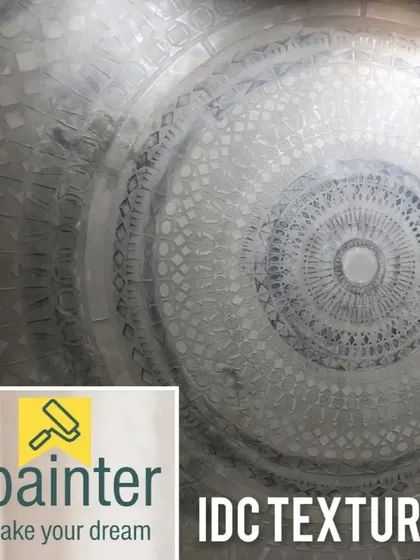 An intricate mandala-inspired texture applied to a ceiling or wall. This detailed work is a form of decorative art that can become a stunning centerpiece.