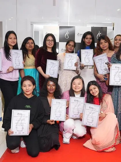 A proud moment for our graduating class. Students and trainers pose with their certificates, celebrating the successful completion of their course and the start of their new careers.