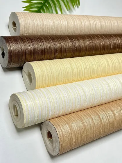 A close-up of my textured wallpaper rolls. You can see the fine, horizontal grain that mimics natural materials, available in a variety of neutral and earthy tones.