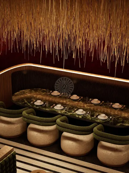 A render of the intimate booth seating, featuring a long marble community table set under a ceiling of textured natural fibers, creating a cozy, tactile experience.