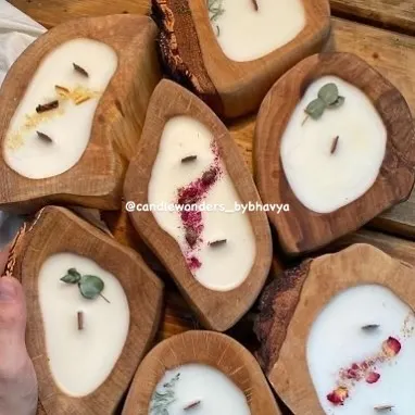 These rustic wooden tea light holders have a live bark edge, bringing a simple and charming feel to your decor.