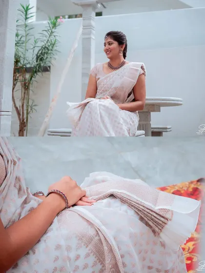 A quiet moment of the bride during her Haldi, showing the details of her simple and elegant saree.