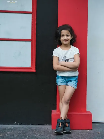 This stylish young girl is ready to take on the world. We love her confident pose and cool attitude.