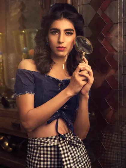 A series from a vintage-themed shoot. I mixed different textures and patterns, like a denim crop top with checkered pants and a floral dress, to create a retro-inspired story with a modern twist.