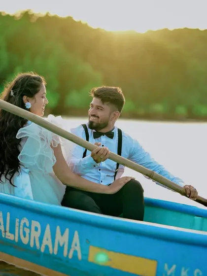Create a romantic pre-wedding story with our couple's outfits. This scene features a classic white gown and a smart shirt-and-bowtie look, perfect for a serene sunset boat ride.