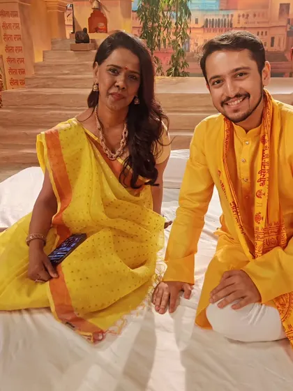 A behind-the-scenes moment, sitting on the set which was designed to look like the ghats of a holy city. The attention to detail was incredible.