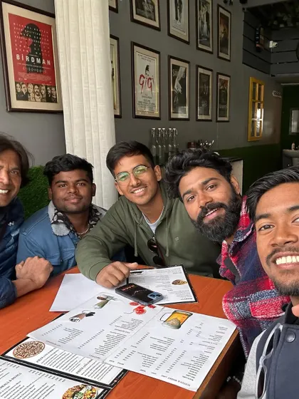 A happy moment with the boys over a meal. It's important to relax and build friendships off the field.