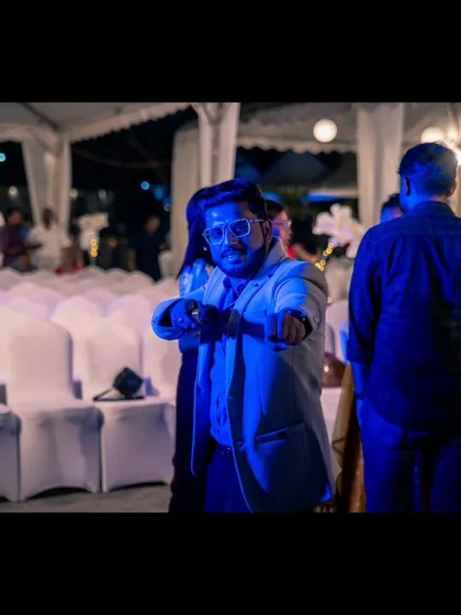 A candid shot of me in action, pointing and engaging with the crowd.