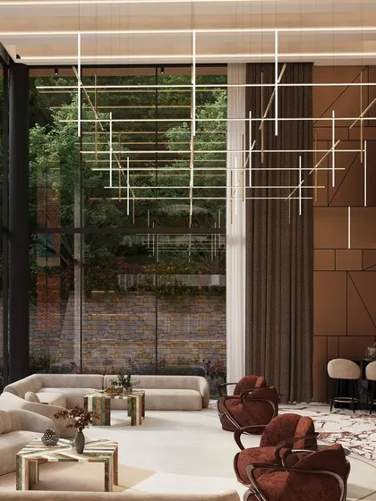 The interior of the Forest House, where a double-height living room is flooded with natural light. The design philosophy is biophilic, connecting the inhabitants with nature through views, materials, and the integration of indoor plants.
