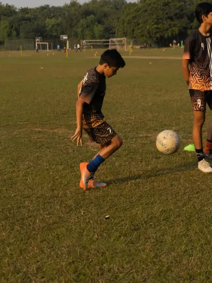 Another look at Chahit Samota working on his ball control. Consistent practice on fundamental skills is the foundation of success.