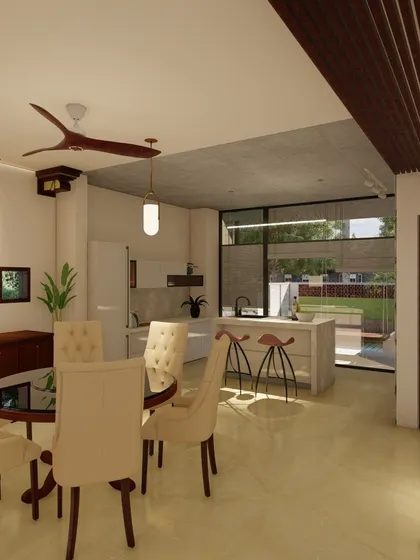 The dining and kitchen area in our Hollywood Town project opens directly onto the garden. The open-plan layout and large windows ensure that daily activities are always connected to the natural surroundings.