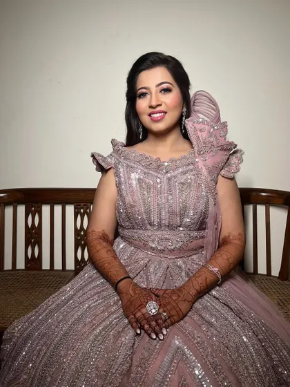 A princess moment for the Sangeet. This bride chose a stunning lavender gown, and we created a soft, romantic makeup look with a pink lip to match.
