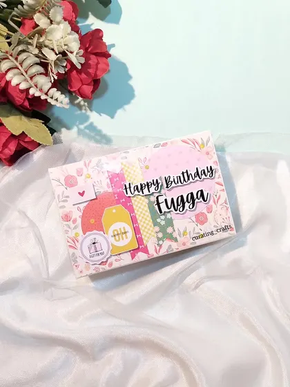 The cover of the mini scrapbook, personalized with a nickname, "Fugga".