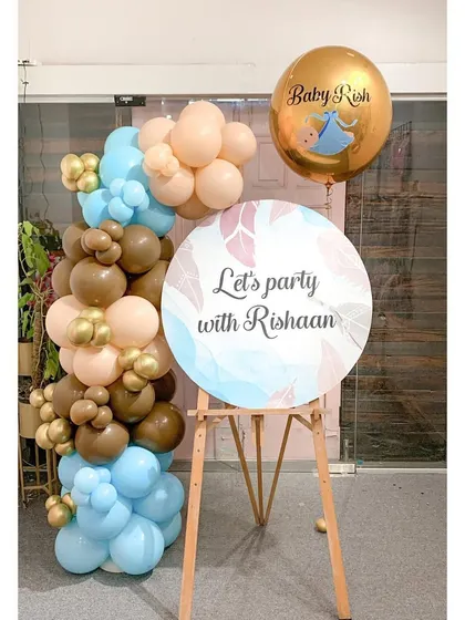 "Let's party with Rishaan!" This welcome easel uses a trendy teddy bear color palette of brown, beige, and baby blue. It's a modern and fun way to set the tone for a stylish baby shower or first birthday party.