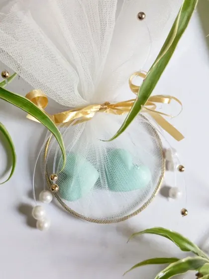 Surrounded by fresh greenery, this favor shows how beautifully my creations can complement natural or botanical-themed wedding decor.