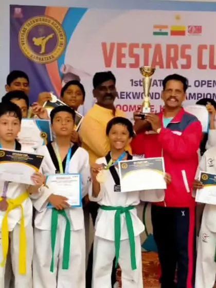 Team Panthers with our trophy from the 1st Vestars Cup G4 Open National Taekwondo Championship. Our students' hard work paid off with 11 Gold, 10 Silver, and 7 Bronze medals.