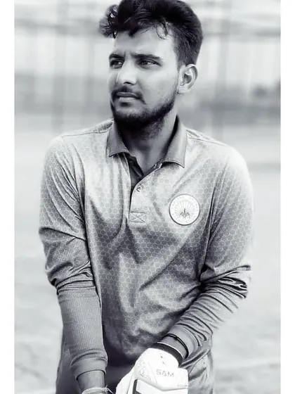 A black and white portrait of our player Kamal Yadav, who represented the Haryana Under-19 team in the Vinoo Mankad Trophy.