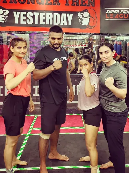 Posing with some of the strong women who train here. They are an inspiration.
