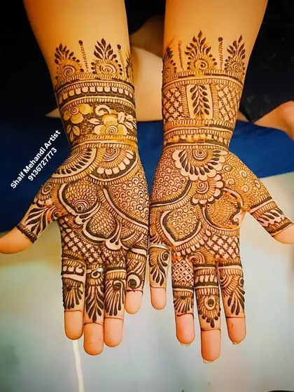 A watermarked version of a traditional Indian mehandi design.