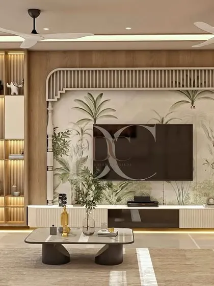 This is what we mean by a living room that is both a centerpiece and a comfort zone. We designed this TV unit with a stunning wallpaper backdrop, integrated display shelves with profile lighting, and a window-side seating area with hidden storage to create a space that is luxurious, functional, and full of personality.
