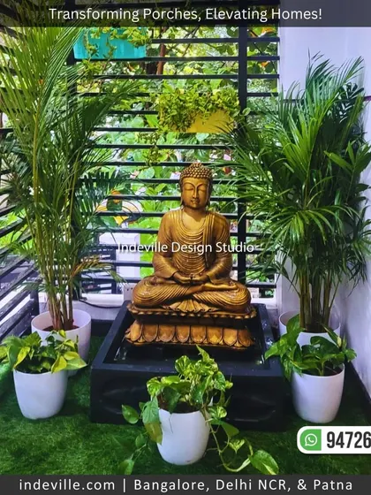 A welcoming front porch I designed to enhance curb appeal. The space features artificial grass, a serene Buddha water feature, and a variety of potted plants to create a peaceful, zen-like entrance.