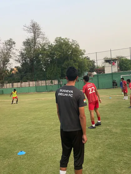 A Sudeva coach observes a training drill led by the VfB team. Our coaches also benefit immensely, upgrading their skills and knowledge through these collaborations.