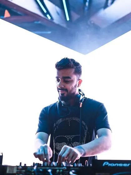 A clean, bright shot of me at the decks against a white background. This highlights my focus and the professional setup I use.