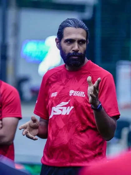 Head Coach Sandeep Singh leads a professional development session for our coaching staff. We invest in our coaches to ensure they bring the latest techniques and highest quality of training to your children.