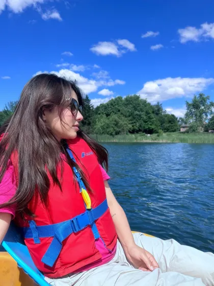 Another shot from the boat, wearing a life vest and enjoying the view.