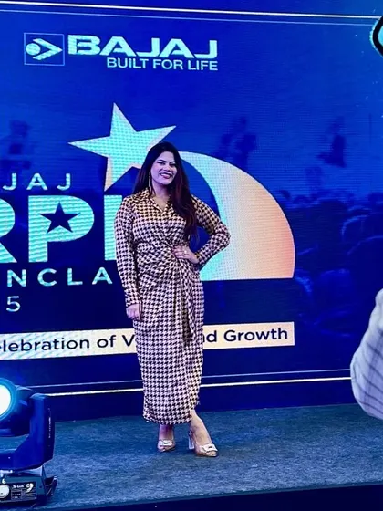 Posing on stage before the Bajaj RPL Conclave 2025. It's all about celebrating vision and growth, and I set a positive and forward-looking tone for the event.