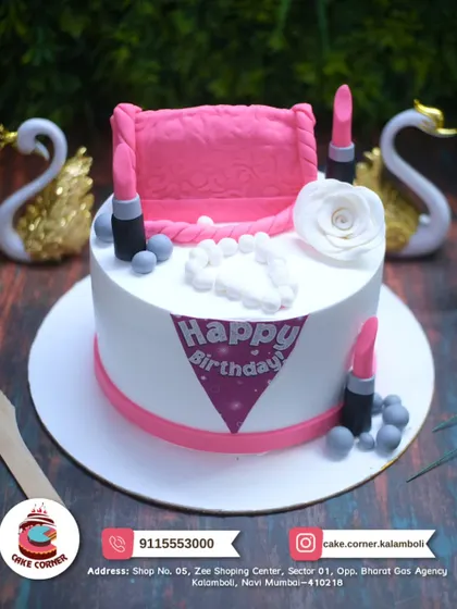 A stylish makeup-themed cake with a pink sofa, lipsticks, and a pearl necklace. A very chic and glamorous design for a birthday.