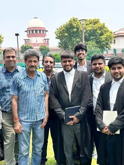 My clients and my legal team standing together outside the Supreme Court. We stand by our clients at every step of the legal process.