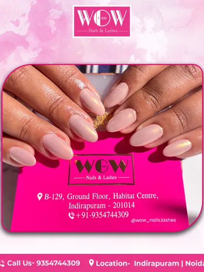 Simple, clean, and elegant. This manicure features a beautiful nude pink polish on perfectly shaped almond nails, proving that sometimes less is more.
