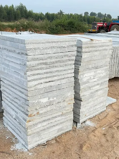 Tall stacks of freshly cut Bangalore stone pavers at my yard. I maintain a large inventory for quick dispatch.