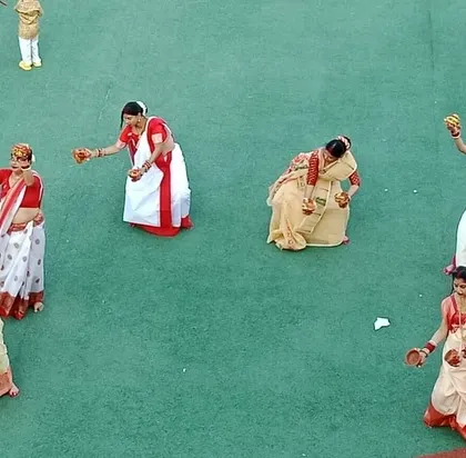 A group of mothers performs a traditional dance during the Navratri celebration, adding grace and cultural richness to the event.