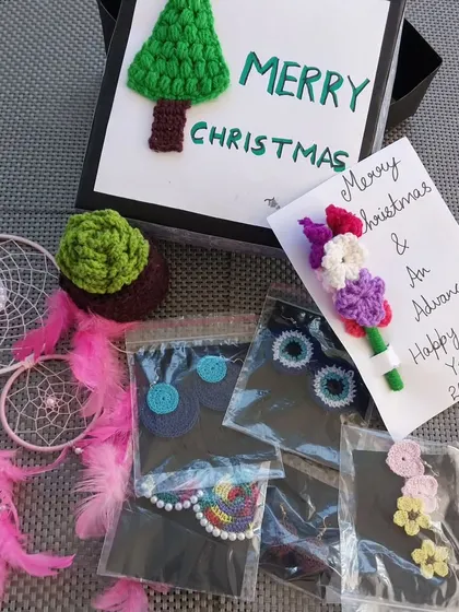 A custom Secret Santa hamper I put together, filled with a variety of my crochet goodies. I can create custom gift boxes for any occasion.