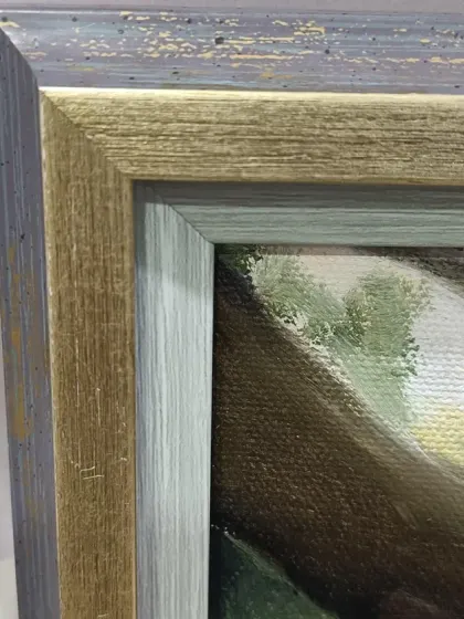 Detail of the custom frame chosen for this piece, which complements the artwork beautifully.